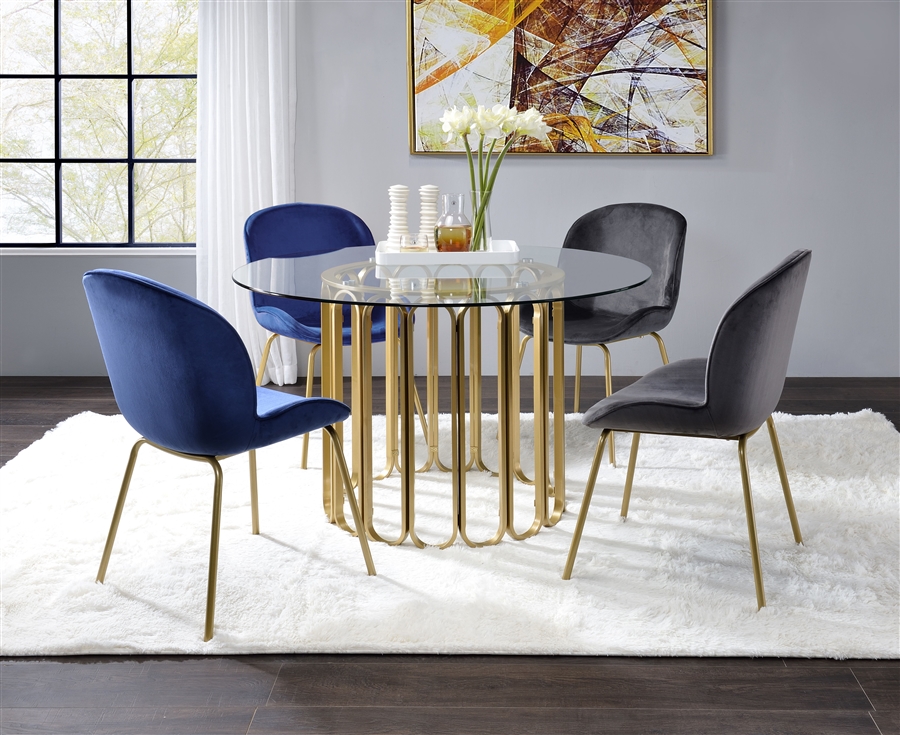 glass table velvet chairs